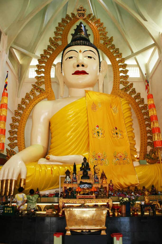 15-metre high Buddha inside Sakya Muni Buddha Gaya Temple Little India. 