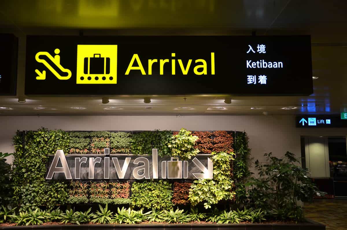 Arrivals sign at Singapore Changi airport.