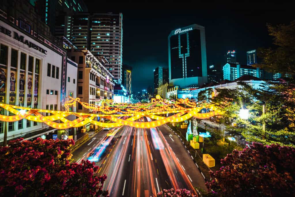 Night-time shot of Singapore's Chinatown with street lights. 