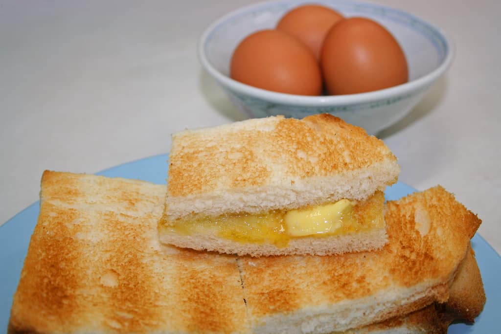 Kaya Toast with a bowl of boiled eggs. 