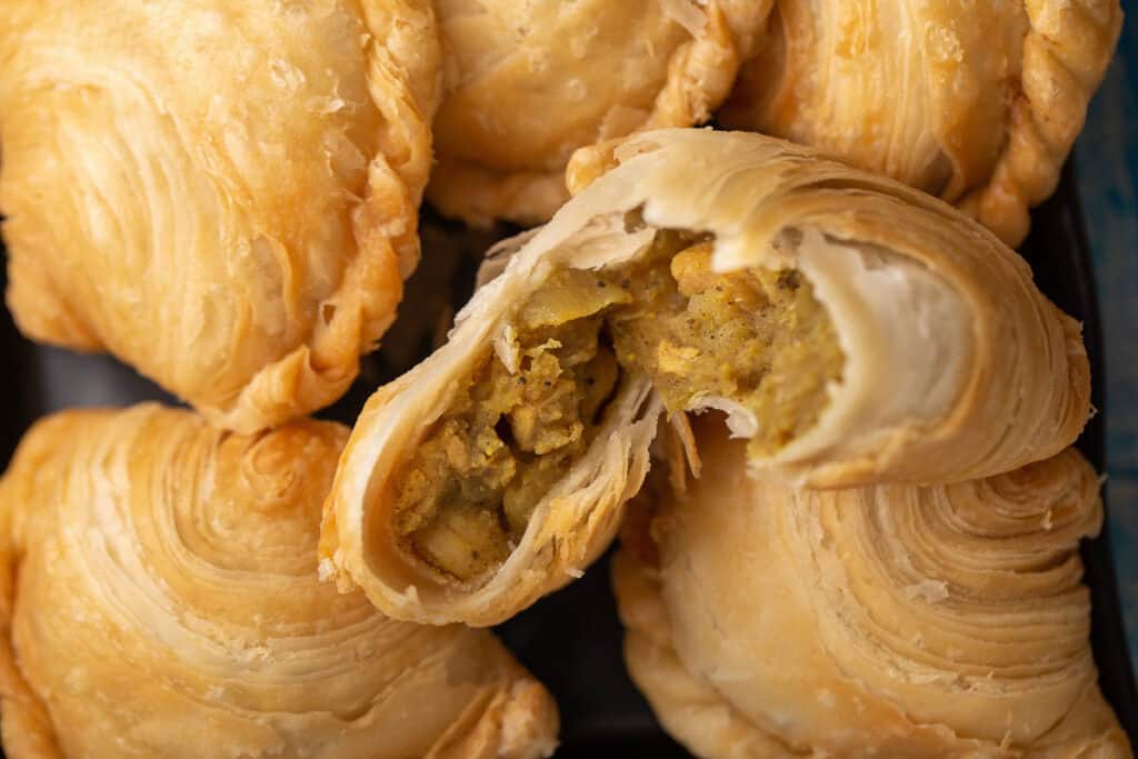 Close-up of Singapore chicken curry puffs. 