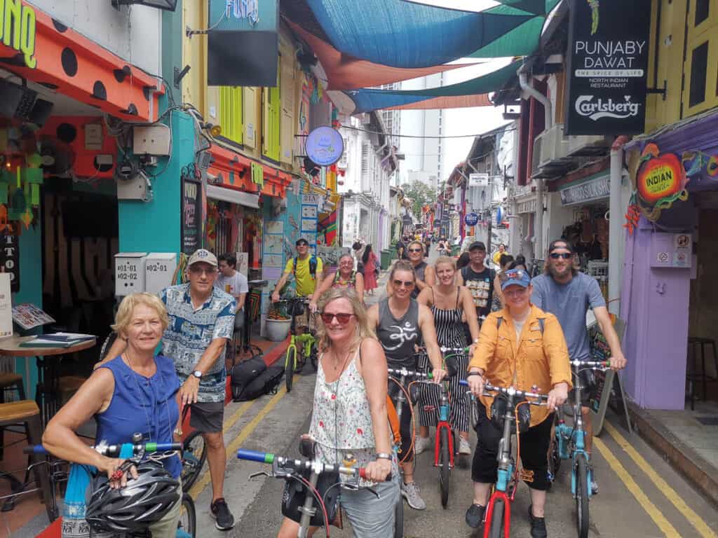 Group of people on bikes on Singapore bike tour. 