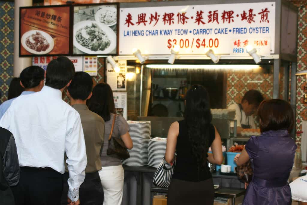 People queuing at a hawker stall.