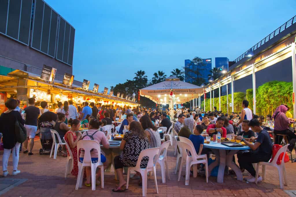 People alfresco dining at Makansutra Gluttons Bay. 