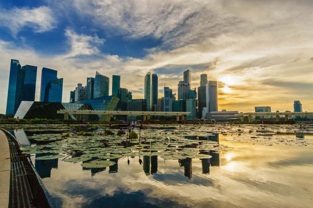 Sunset reflected in water at Marina Bay.