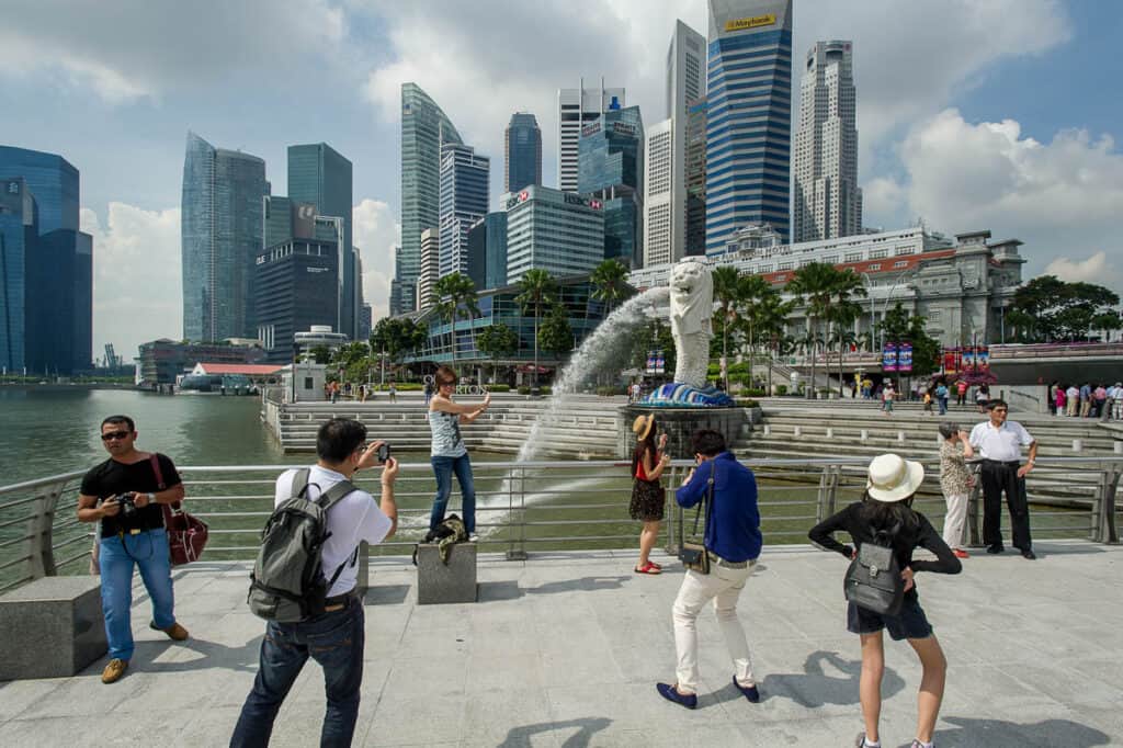 People taking photos at Merlion Park Singapore.