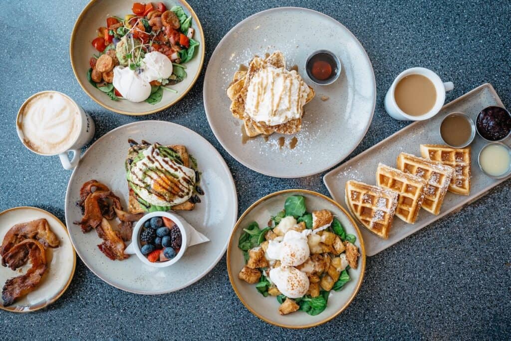 Flatlay of brunch dishes on a table. 