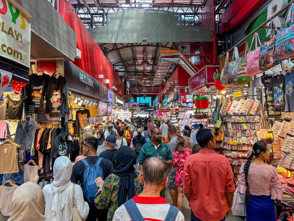 Bugis Street market with crowds of shoppers.