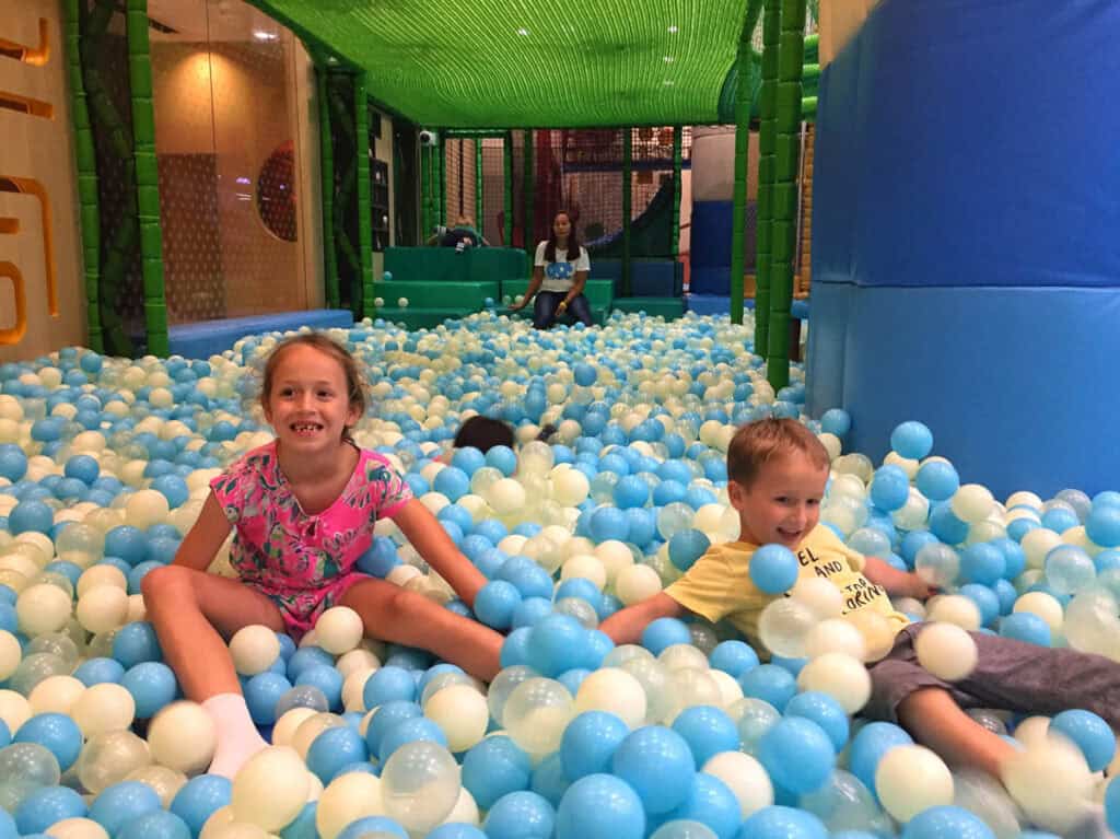 Kids in a ball pit in Singapore.