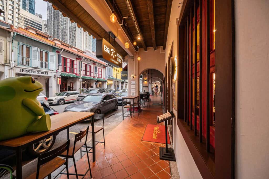Singapore street with covered walkways. 