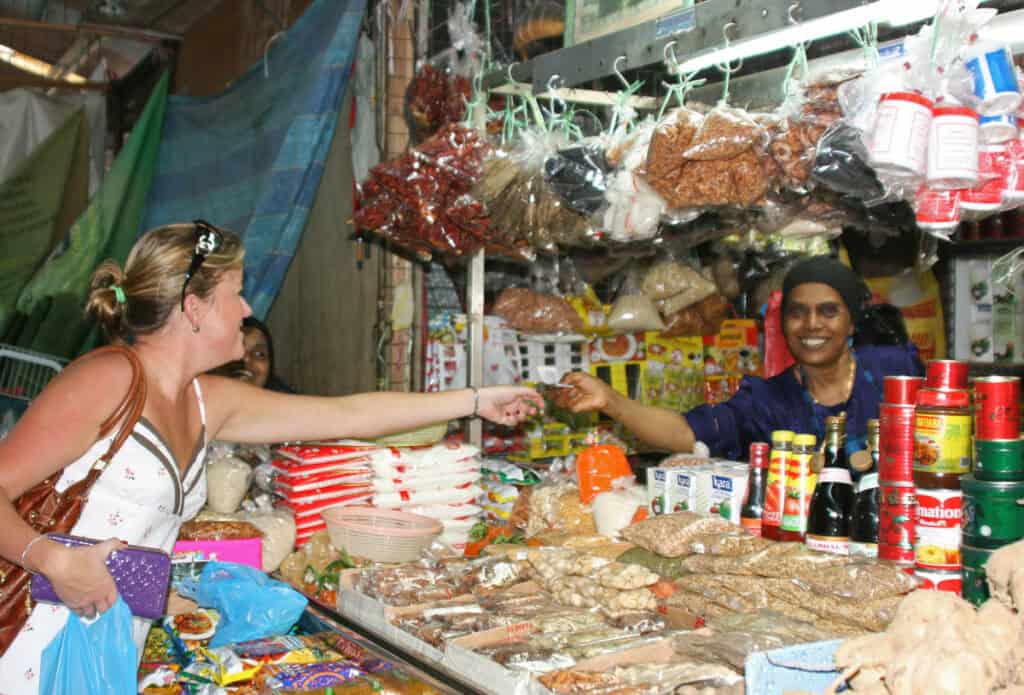 Woman shopping at a wet market.