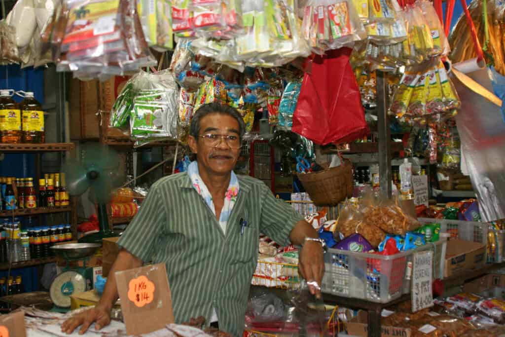 Stall owner at a wet market.
