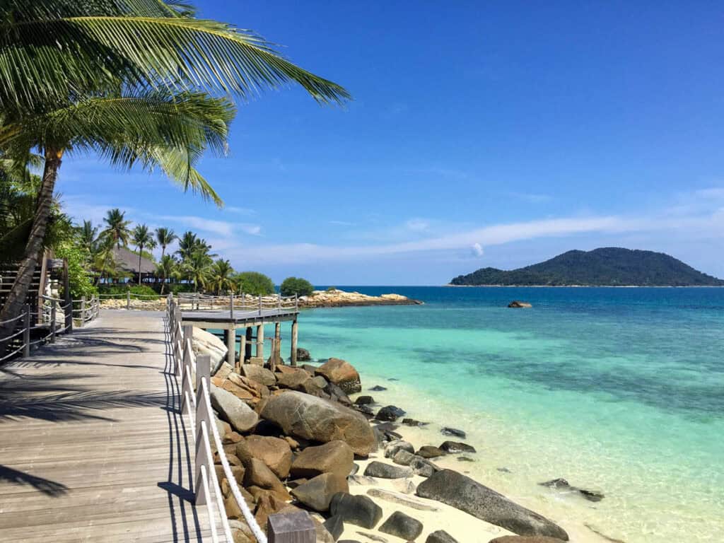 Boardwalk and beach on Batu Batu Malaysia.